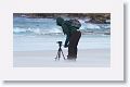 A wall of sand blasts Penguins, photographers and cameras at Volunteer Point