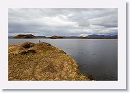 Across the street from our hotel was a hiking trail at the SW corner of Lake Myvatn. The feature there is the psuedo craters of Skutustadir and midges by the millions.